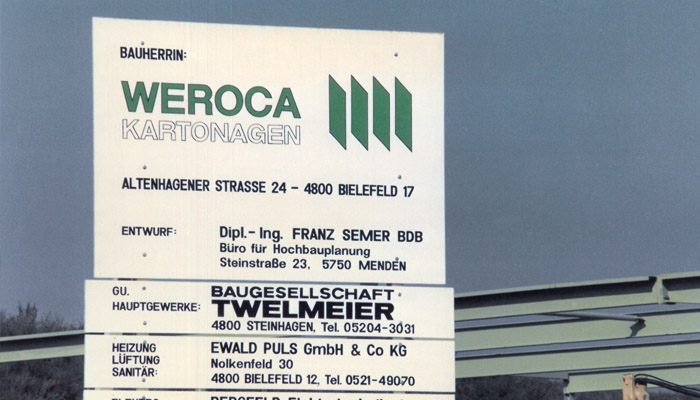 Historisches Bauschild von WEROCA Kartonagen an der Altenhagener Straße 24 in Bielefeld – Zeitzeuge des Umzugs nach Bielefeld-Heepen in den 1980er Jahren