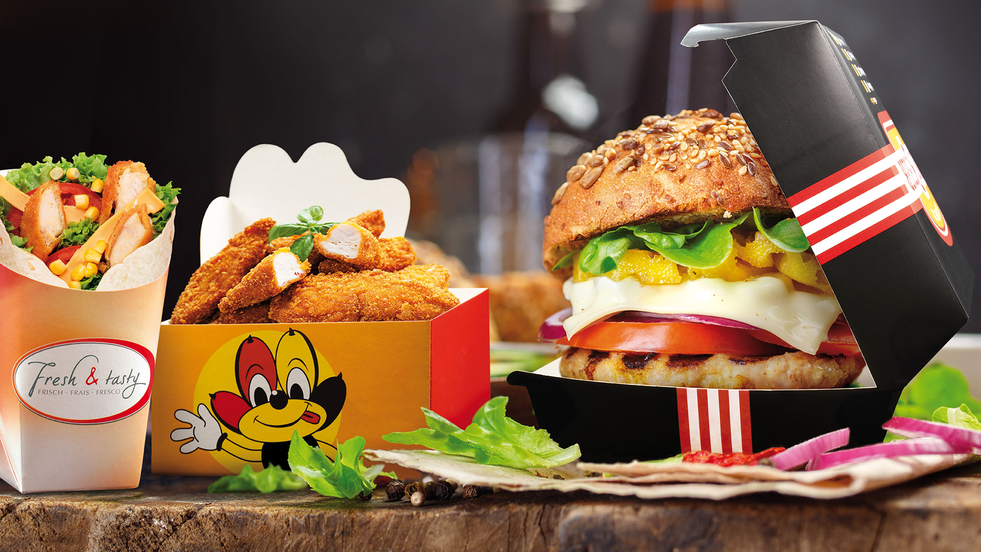 Individuell bedruckte Snack-To-go-Verpackungen für Burger, Chicken und Wraps – Food-Verpackungen für Gastronomie und Foodtrucks von WEROCA Kartonagen Bielefeld
