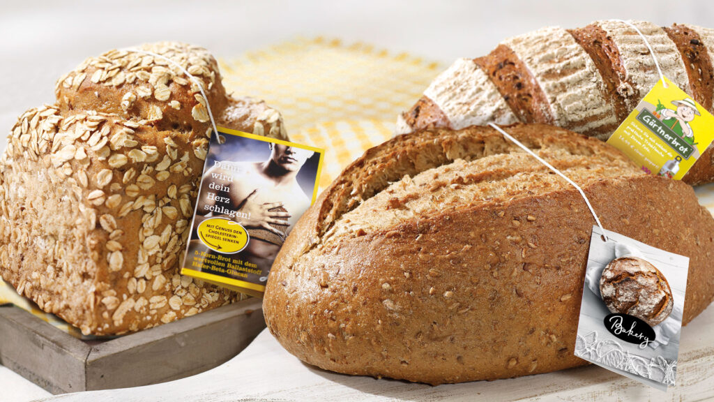 Individually printed food hangtags on various types of bread for bakeries and food retail – product labeling by WEROCA Packaging Bielefeld